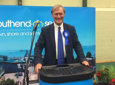 David speaking after being re-elected at the vote count