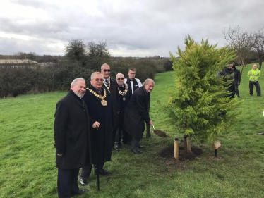 Sir David plants tree to mark Holocaust Memorial Day 
